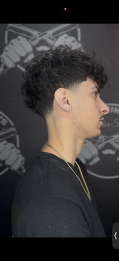 Textured curly crop with a taper fade